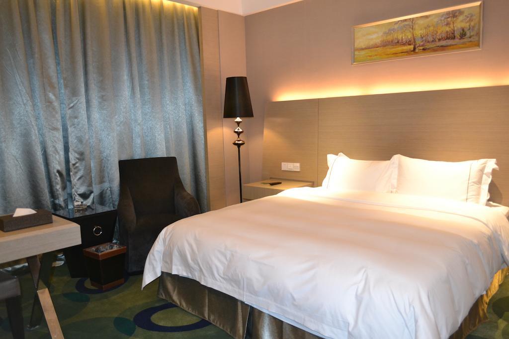 Angel Garden Hotel Huhhot Oda fotoğraf