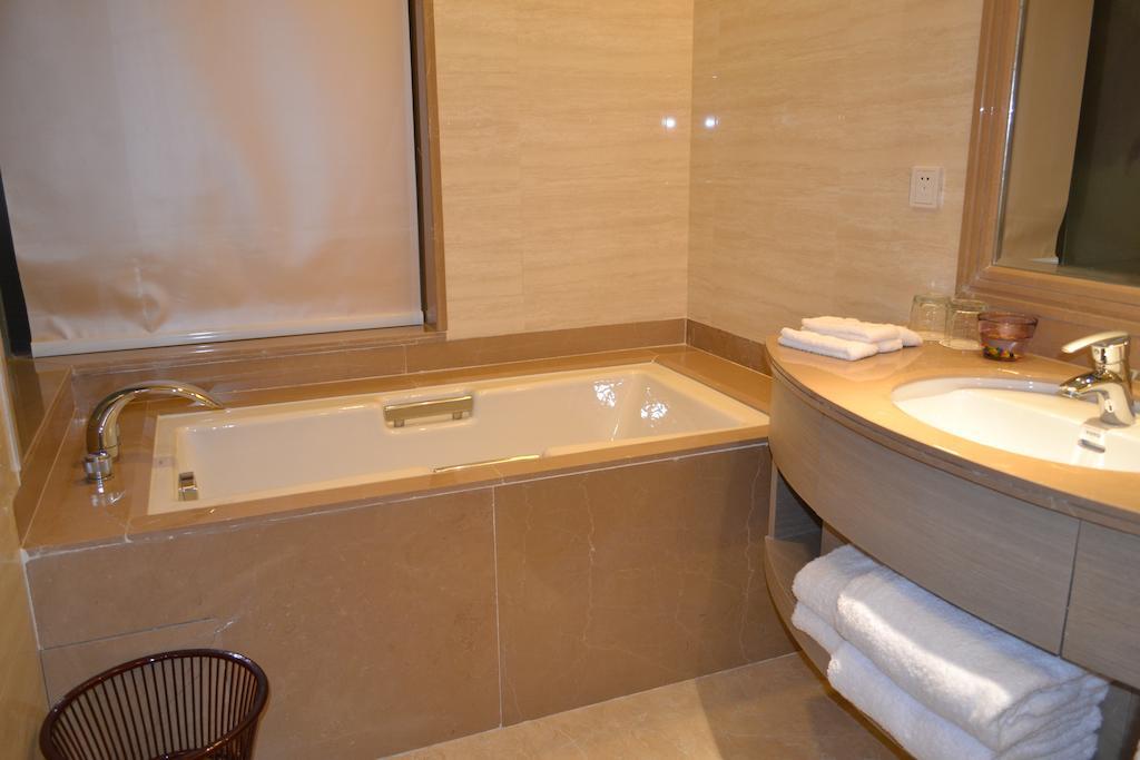 Angel Garden Hotel Huhhot Oda fotoğraf
