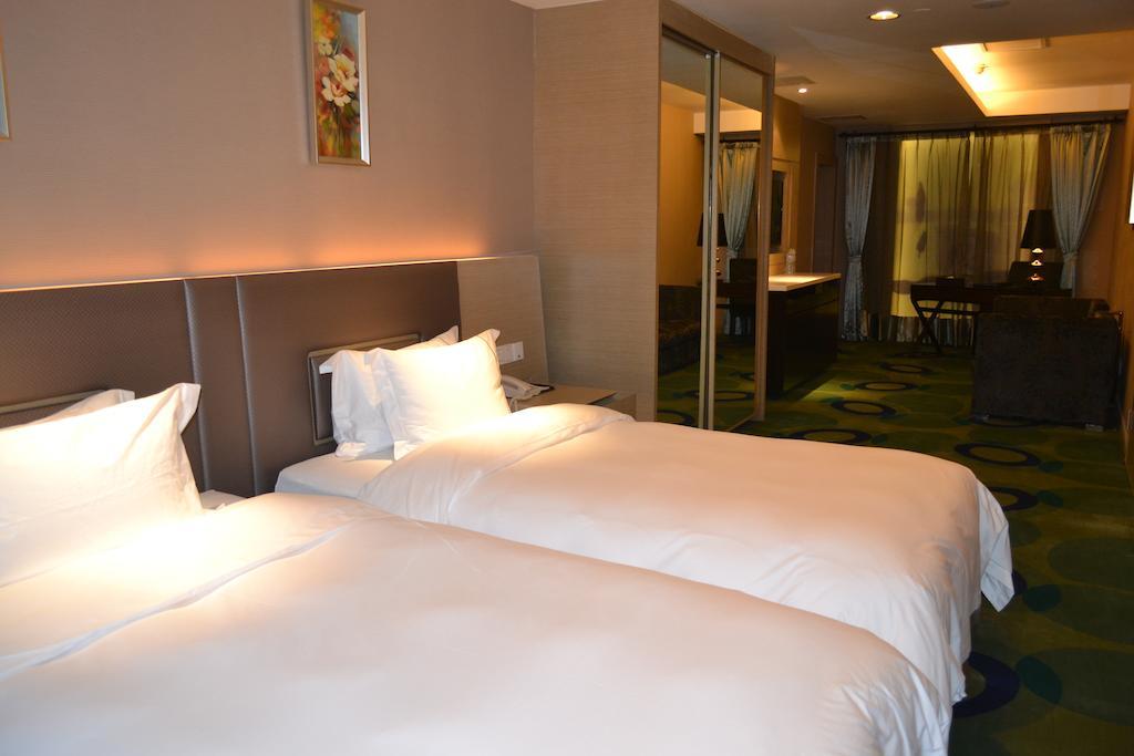 Angel Garden Hotel Huhhot Oda fotoğraf